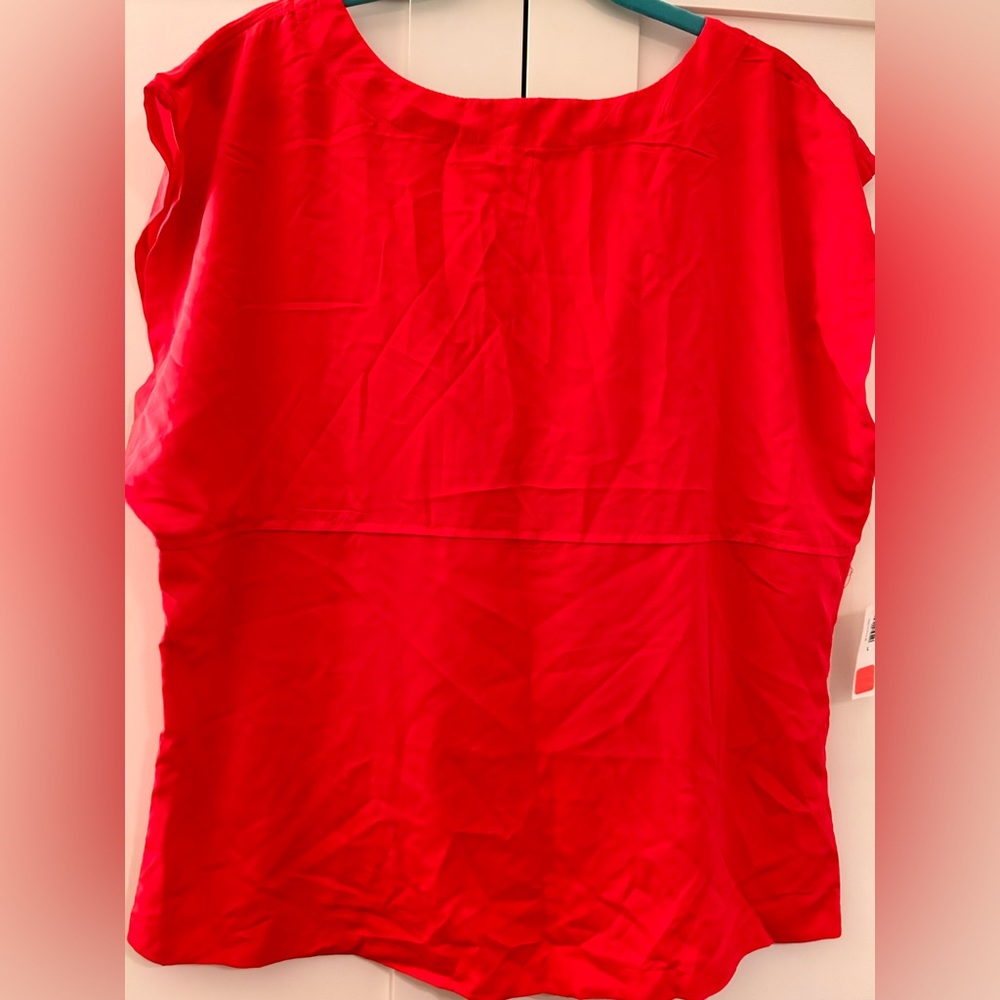 Old navy, coral, large blouse cap sleeve never worn with tag. Slightly open back